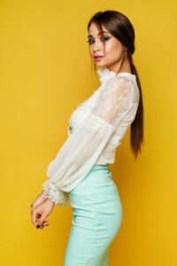 Woman Standing Wearing White Floral Lace Blouse